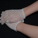 Stretch mesh gloves. Fit small child to small adult.